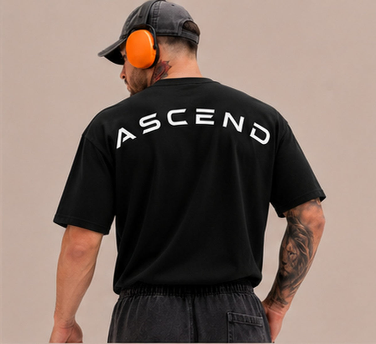 ASCEND Oversized Performance Tee, back with arched ASCEND print