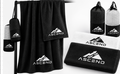 ASCEND Microfibre Training Towel in black and white with mesh carry pouches